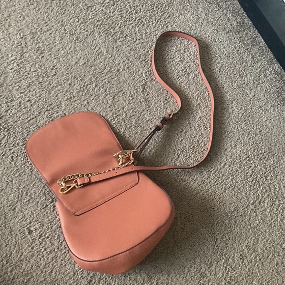 This is a peach color, a crossbody bag from target. - Picture 4 of 4